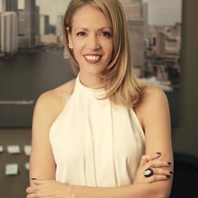 Romina Saaied, insurance advisor at We Insure Downtown Miami, looking at the camera.